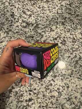 NeeDoh Cool Cats Purple Squishy Cat Toy in Box